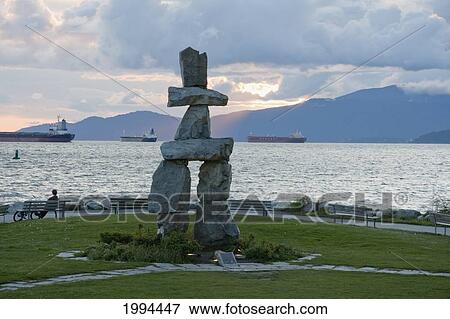 Stock Photo - Inukshuk In English Bay At Dusk, Vancouver, British Columbia, Canada. Fotosearch
