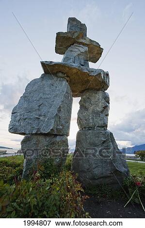 Inukshuk In English Bay At Dusk, Vancouver, British Columbia, Canada View Large Photo Image Stock Photo - Inukshuk In English Bay At Dusk, Vancouver, British Columbia, Canada. Fotosearch