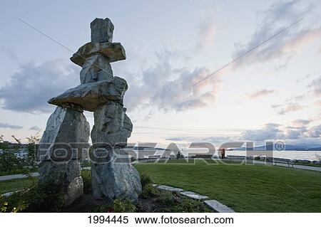 Stock Photography - Inukshuk In English Bay At Dusk, Vancouver, British Columbia, Canada. Fotosearch