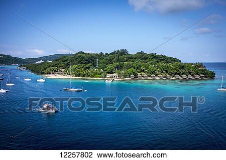 Stock Image - Iririki Island resort viewed from Port Vila; Efate Island, Vanuatu. Fotosearch