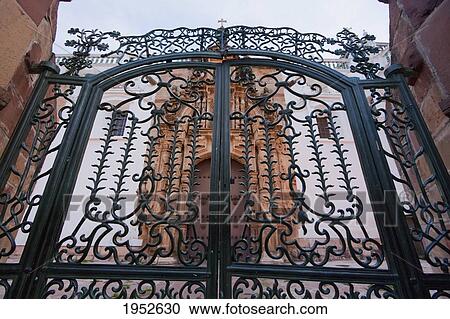 Stock Image - Iron gates by the lateral entrance to the Metropolitan Cathedral, Sucre, Chuquisaca Department, Bolivia. Fotosearch