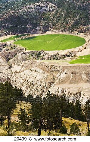 Stock Photo - Irrigation System On Field Near Lillooet, British Columbia. Fotosearch