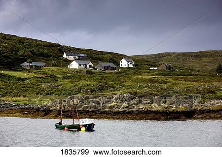 Isle Of Colonsay, Scotland; Sailboat And Coastal Dwellings View Large Photo Image Stock Photo - Isle Of Colonsay, Scotland; Sailboat And Coastal Dwellings. Fotosearch