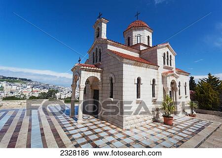 Stock Photograph - Israel, and is site from which jesus sent two of his disciples to bring him donkey on which he rode into jerusalem; Bethphage, is a villalge on mt. Of olives, This beautiful greek orthodox church overlooks bethany from bethpage. Bethpage. Fotosearch