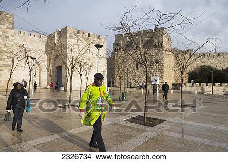 Israel, Jaffa Gate; Jerusalem, African pilgrim wearing Jesus coat View Large Photo Image Picture - Israel, Jaffa Gate; Jerusalem, African pilgrim wearing Jesus coat. Fotosearch