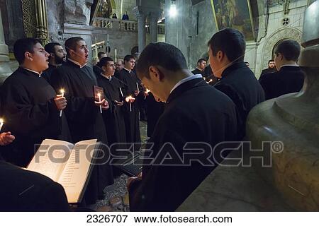 Stock Photo - Israel, Jerusalem Old City, Armenian daily procession in Church of Holy Sepulchre; Jerusalem. Fotosearch