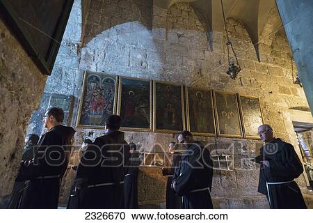Stock Image - Israel, Jerusalem Old City, Holy Sepulcher; Jerusalem, Franciscan friars at start of daily franciscan procession. Fotosearch