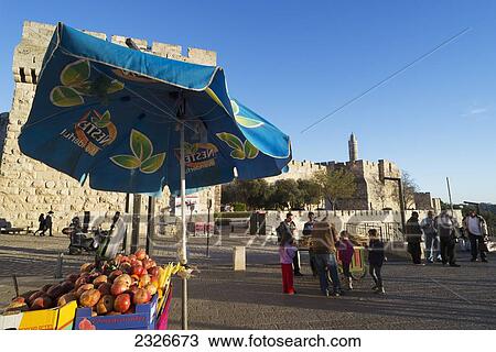 Israel, Jerusalem Old City, Jaffa Gate; Jerusalem, Pomegranate juice stall with Citadel of David in background View Large Photo Image Stock Image - Israel, Jerusalem Old City, Jaffa Gate; Jerusalem, Pomegranate juice stall with Citadel of David in background. Fotosearch