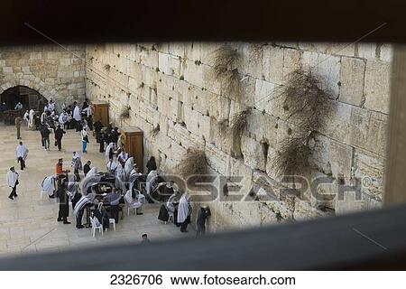 Stock Photograph - Israel, Jerusalem Old City, View of Western Wall from temporary bridge leading to esplanade of mosques; Jerusalem. Fotosearch