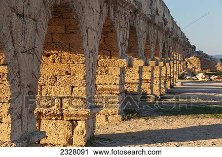 Stock Image - Israel, near town of Caesarea. Ancient Caesarea Maritima city and harbor was built by Herod Great. city has been populated through late Roman and Byzantine era; Caesarea Maritima National Park, Caesarea Maritima is a national park on Israeli coastline. Fotosearch