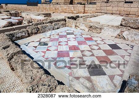 Stock Photo - Israel, near town of Caesarea. Ancient Caesarea Maritima city and harbor was built by Herod Great. city has been populated through late Roman and Byzantine era; Caesarea Maritima National Park, Caesarea Maritima is a national park on Israeli coastline. Fotosearch