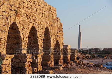 Stock Photo - Israel, near town of Caesarea. Ancient Caesarea Maritima city and harbor was built by Herod Great. city has been populated through late Roman and Byzantine era; Caesarea Maritima National Park, Caesarea Maritima is a national park on Israeli coastline. Fotosearch