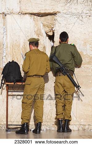Israel, Rear view of soldiers praying at Wailing wall; Jerusalem View Large Photo Image Stock Image - Israel, Rear view of soldiers praying at Wailing wall; Jerusalem. Fotosearch
