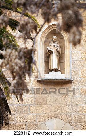 Stock Image - Israel, Sculpture of Franciscan monk; Jerusalem. Fotosearch