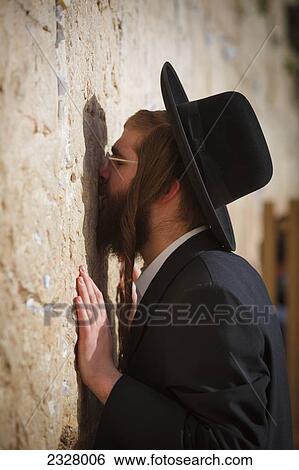 Israel, Side view of man praying at Wailing wall; Jerusalem View Large Photo Image Stock Photograph - Israel, Side view of man praying at Wailing wall; Jerusalem. Fotosearch
