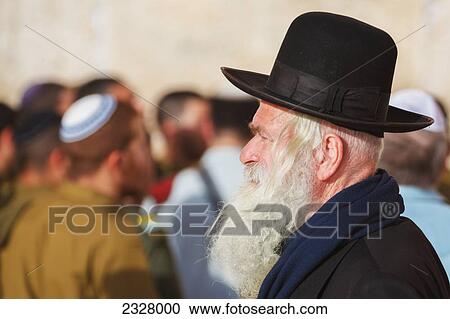 Israel, Side view of man with Wailing wall in background; Jerusalem View Large Photo Image Stock Image - Israel, Side view of man with Wailing wall in background; Jerusalem. Fotosearch