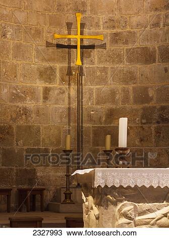 Stock Image - Israel, View of cross and altar in St Anne's Church; Jerusalem. Fotosearch