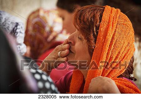 Israel, View of woman praying at Wailing wall; Jerusalem View Large Photo Image Stock Photography - Israel, View of woman praying at Wailing wall; Jerusalem. Fotosearch