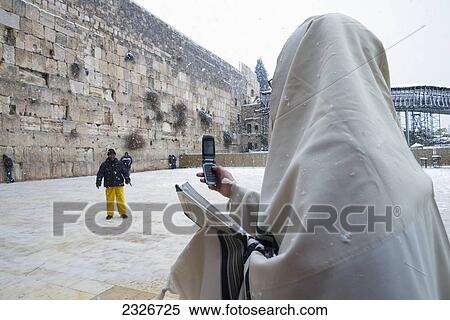 Israel, Western Wall; Jerusalem, 2013, January 10, Tourist photographing friend View Large Photo Image Stock Photography - Israel, Western Wall; Jerusalem, 2013, January 10, Tourist photographing friend. Fotosearch