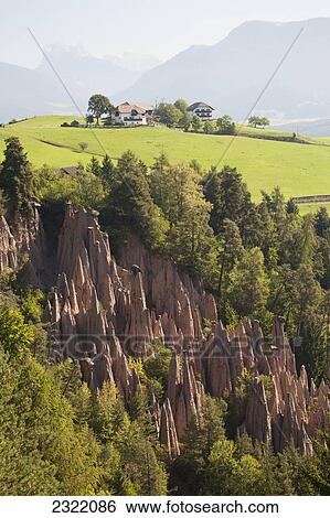 Italy, Alto Adige, Dolomites, Bolzano, Large cluster of natural eroded rock formations in mountains View Large Photo Image Stock Photograph - Italy, Alto Adige, Dolomites, Bolzano, Large cluster of natural eroded rock formations in mountains. Fotosearch