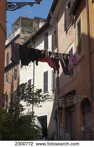 Italy, Drying Laundry; Rome, Trastevere Narrow Colorful Street View Large Photo Image Stock Image - Italy, Drying Laundry; Rome, Trastevere Narrow Colorful Street. Fotosearch