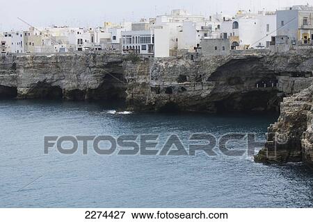 Stock Photo - Italy, Puglia, Polignano a Mare is a pictaresque historic town located on the Adriatic Sea; Polignare del Mare. Fotosearch