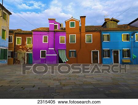 Stock Photography - Italy, Venice, Colorful apartment buildings. Fotosearch
