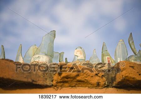 Jagged Glass On Wall; Mazatlan, Sinaloa, Mexico View Large Photo Image Stock Photo - Jagged Glass On Wall; Mazatlan, Sinaloa, Mexico. Fotosearch