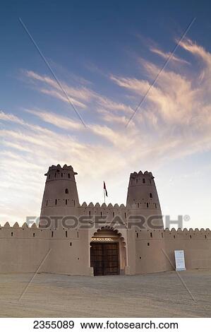 Jahili Fort at sunrise; Al Ain, Abu Dhabi, United Arab Emirates View Large Photo Image Stock Photo - Jahili Fort at sunrise; Al Ain, Abu Dhabi, United Arab Emirates. Fotosearch