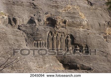 Picture - Jain Sculptures Carved In To The Cliff On The Southern Approach To The Fort, Gwalior, Madhya Pradesh, India. Fotosearch