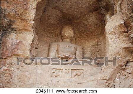 Stock Image - Jain Sculptures Carved In To The Cliff On The Southern Approach To The Fort, Gwalior, Madhya Pradesh, India. Fotosearch
