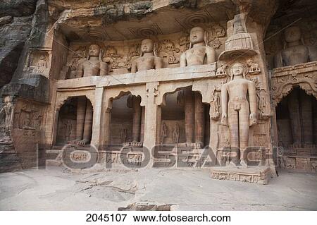 Stock Photo - Jain Sculptures Carved In To The Cliff On The Southern Approach To The Fort, Gwalior, Madhya Pradesh, India. Fotosearch