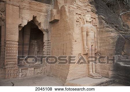 Stock Photo - Jain Sculptures Carved In To The Cliff On The Southern Approach To The Fort, Gwalior, Madhya Pradesh, India. Fotosearch