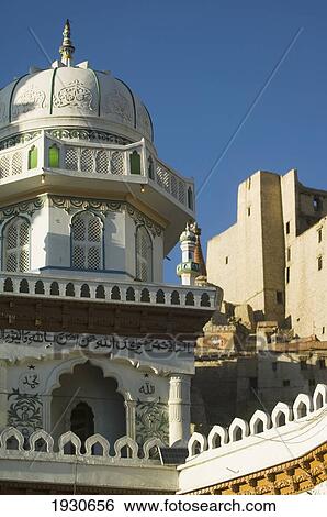Stock Photograph - Jama Masjid mosque in Leh with Leh Palace behind. Leh was the capital of the Himalayan kingdom of Ladakh, now the Leh District in the state of Jammu and Kashmir, India. Leh is at an altitude of 3, 500 meters (11, 483 ft).. Fotosearch