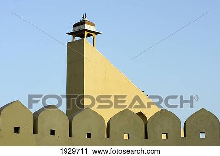 Jantar Mantar, an observatory begun by Jai Singh in 1728. Looks like bizarre sculptures near the City Palace inside the old walled town in Jaipur, capital of Rajasthan, India. March. ÊAsia. ÊView Large Photo Image Stock Image - Jantar Mantar, an observatory begun by Jai Singh in 1728. Looks like bizarre sculptures near the City Palace inside the old walled town in Jaipur, capital of Rajasthan, India. March. ÊAsia. Ê. Fotosearch