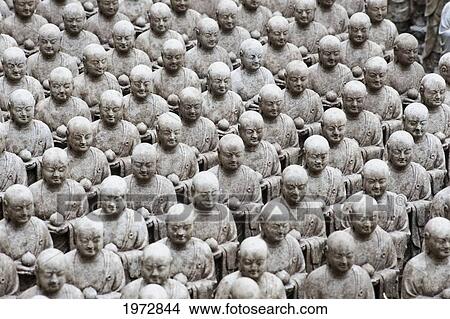Picture - Japan, Kamakura, Hase-Dera Temple, Jizo-Do Hall, Rows Of Jizo Statues Comfort Souls Of Unborn Children.. Fotosearch