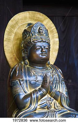 Japan, Kamakura, Hase-Dera Temple, Golden And Bronze Close Up Of Praying Statue. View Large Photo Image Stock Photograph - Japan, Kamakura, Hase-Dera Temple, Golden And Bronze Close Up Of Praying Statue.. Fotosearch