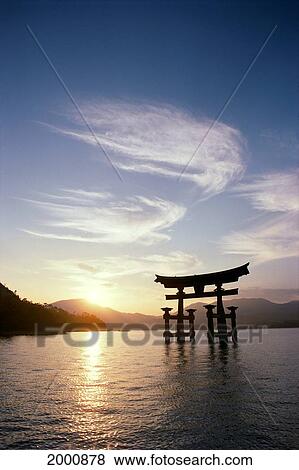 Japan, Miyajima Inland Sea, Itsuku Shima Shrine At Sunset, Wispy Clouds View Large Photo Image Stock Photo - Japan, Miyajima Inland Sea, Itsuku Shima Shrine At Sunset, Wispy Clouds. Fotosearch