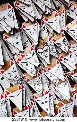 Japan, Numerous Paper Triangles With Various Human And Animal Faces; Kyoto View Large Photo Image Stock Image - Japan, Numerous Paper Triangles With Various Human And Animal Faces; Kyoto. Fotosearch