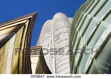 Japan, Roppongi Hills; Tokyo, Upward View Of Mori Tower Framed By Glass And Stone Of Lower Structures View Large Photo Image Stock Photo - Japan, Roppongi Hills; Tokyo, Upward View Of Mori Tower Framed By Glass And Stone Of Lower Structures. Fotosearch
