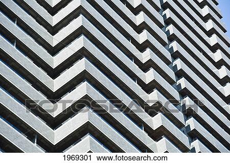 Stock Image - Japan, Tokyo, Akasaka, Izumi Garden Residence, Dramatic Angular Patterned Exterior Of Building.. Fotosearch