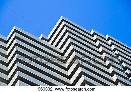 Stock Image - Japan, Tokyo, Akasaka, Izumi Garden Residence, Dramatic Angular Patterned Exterior Of Building.. Fotosearch