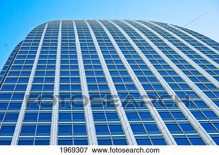 Stock Photo - Japan, Tokyo, Atago Green Hills Mori Tower, Colorful Glass Exterior Of Building.. Fotosearch