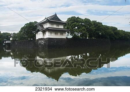 Picture - Japan, Tokyo, Japanese architecture reflected in water. Fotosearch
