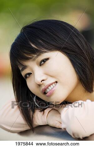 Japan, Tokyo, Roppongi, Pretty Young Asian Woman Posing For Portrait. View Large Photo Image Picture - Japan, Tokyo, Roppongi, Pretty Young Asian Woman Posing For Portrait.. Fotosearch