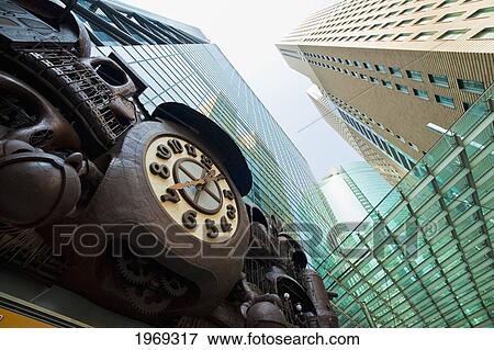 Japan, Tokyo, Shiodome, Famous Copper Shiodome Clock And High Rises. View Large Photo Image Stock Photo - Japan, Tokyo, Shiodome, Famous Copper Shiodome Clock And High Rises.. Fotosearch