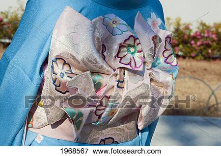 Japan, Tokyo, Shot Of Obi Sash On Pretty Japanese Girl In Blue Kimono. View Large Photo Image Stock Photo - Japan, Tokyo, Shot Of Obi Sash On Pretty Japanese Girl In Blue Kimono.. Fotosearch