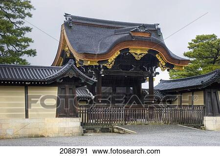 Stock Image - Japanese Temple Gate With Golden Accents; Kyoto, Japan. Fotosearch