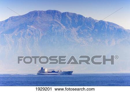 Stock Image - Jebal Musa, Or Mount Musa, Morocco, Seen Across The Strait Of Gibraltar From Near Tarifa, Spain; Morocco. Fotosearch