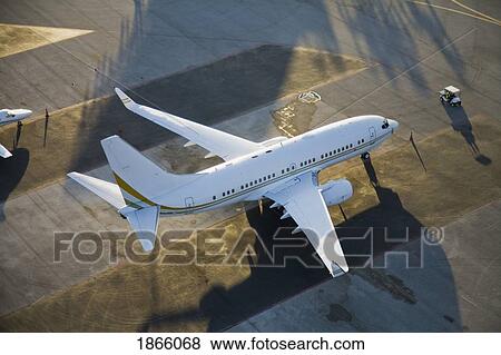 Stock Photo - Jet Airplane Grounded On An Airport Tarmac, Miami, Florida, Usa. Fotosearch